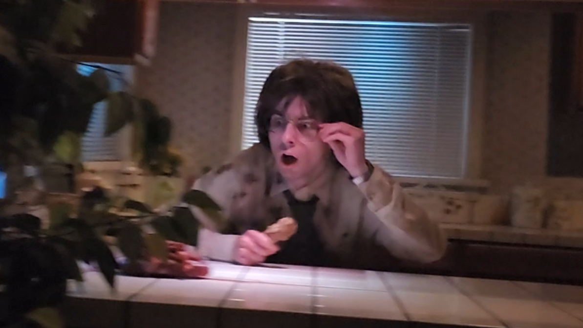 Ryan portraying the kitchen scene in Poltergeist